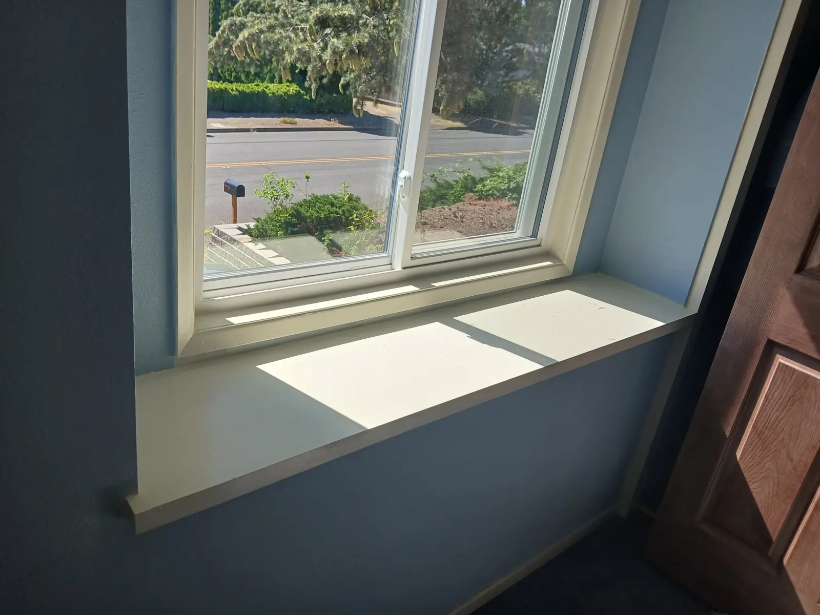 Second painted window sill with new casing